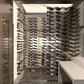 contemporary wine room with floating wine racks by genuwine cellars